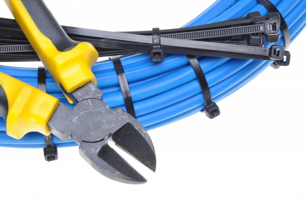 pliers with electric cables and ties