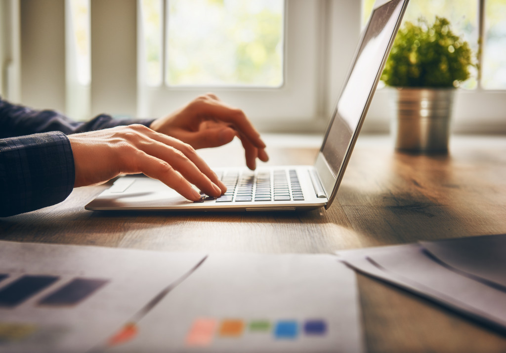 man using laptop