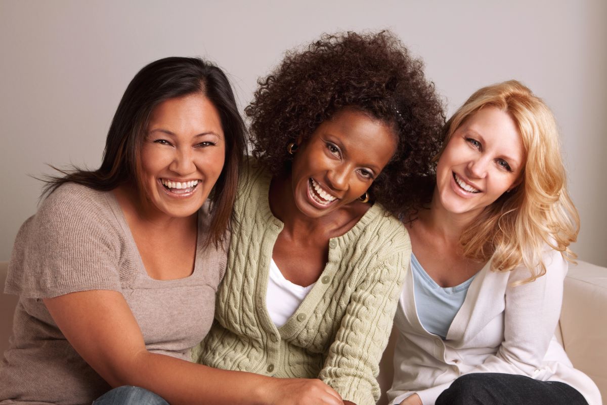 three women of different ethnic backgrounds