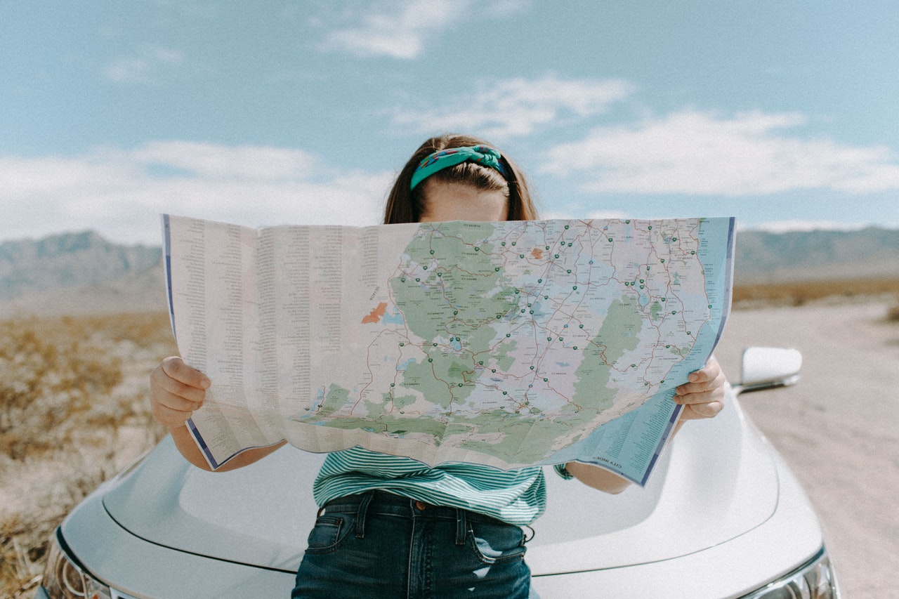 woman holding map