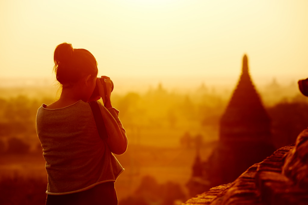 woman taking pictures