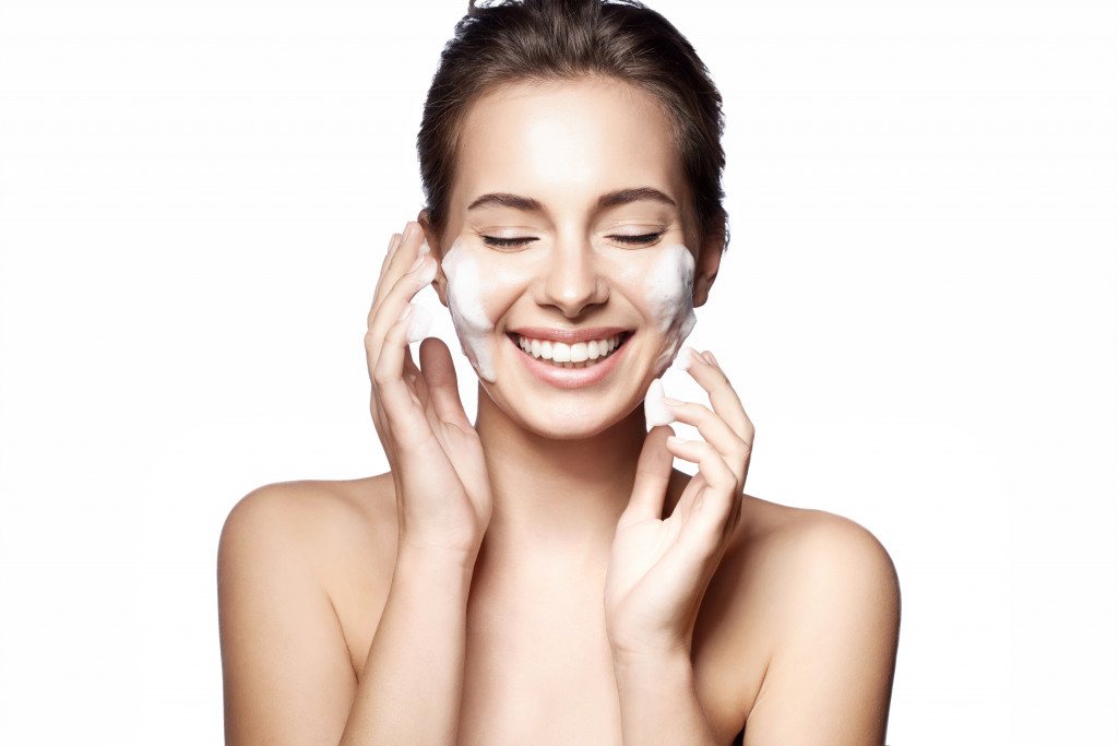 woman applying skincare