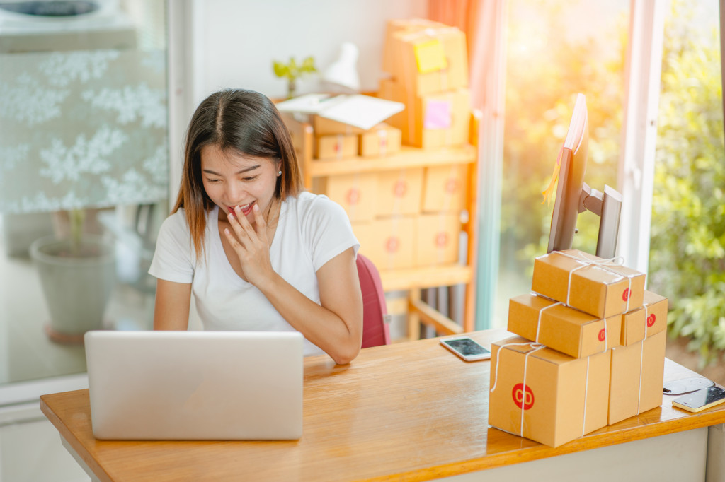 woman making sales from her online shop